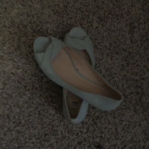 Woman’s blue green flats